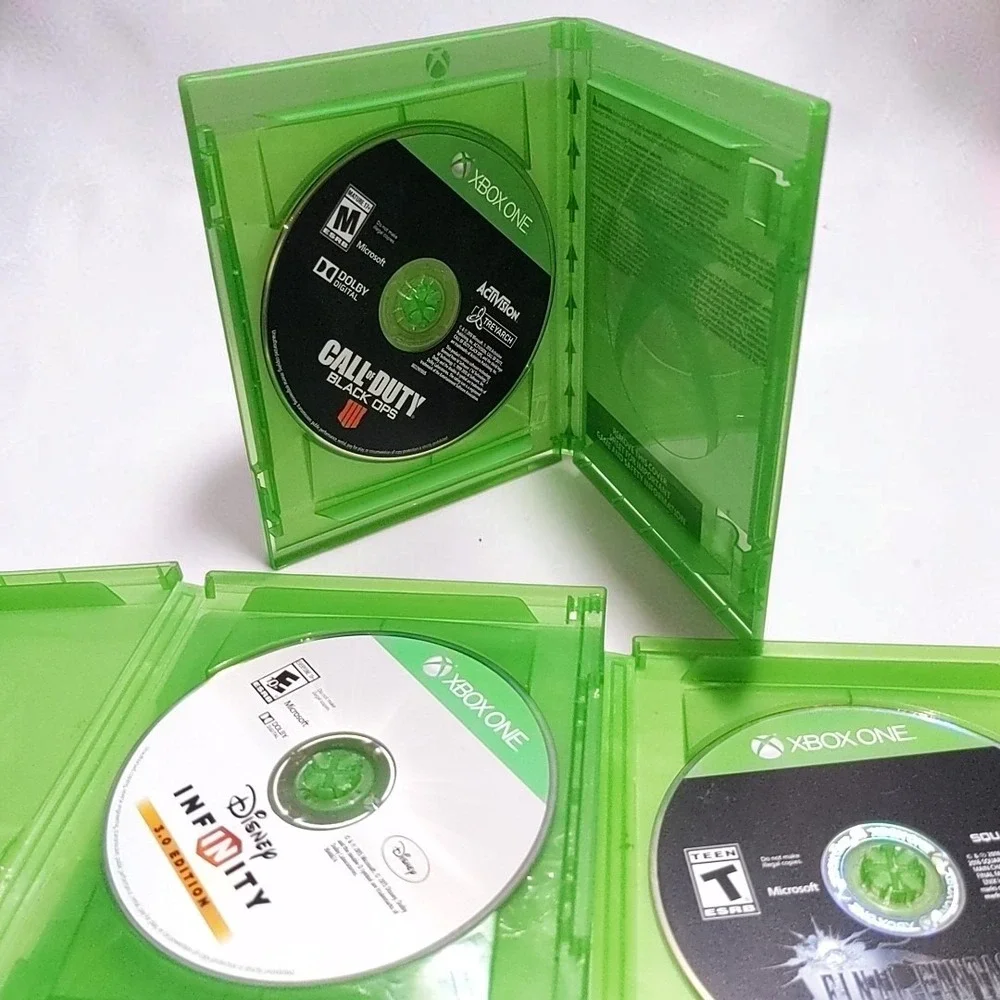 Microsoft Xbox One Video Game Lot Bundle 7 Discs COD Black Ops IV WWII Fallout 4